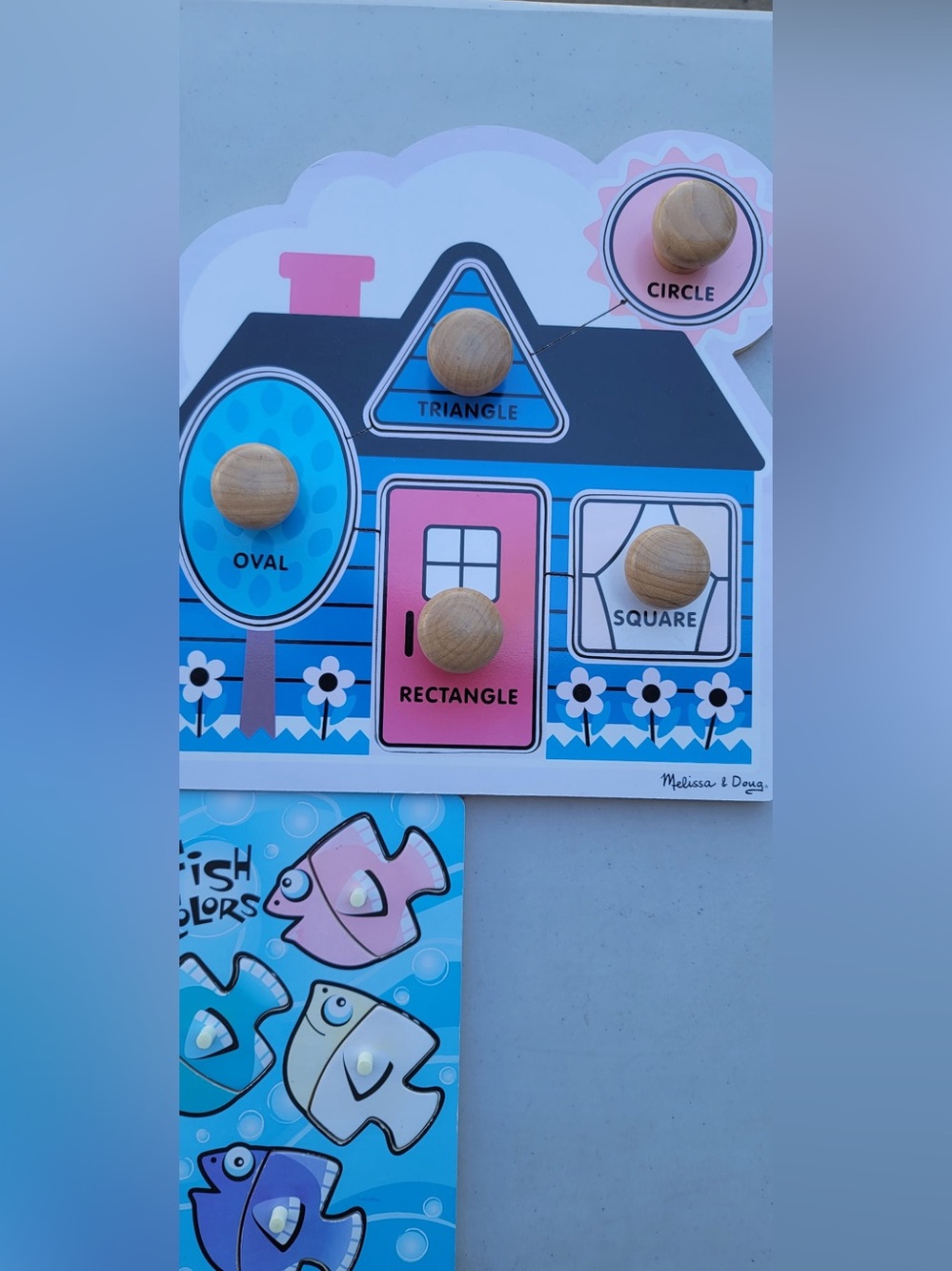 Melissa & Doug Blue and Pink Shape-Sorting House Peg Puzzle